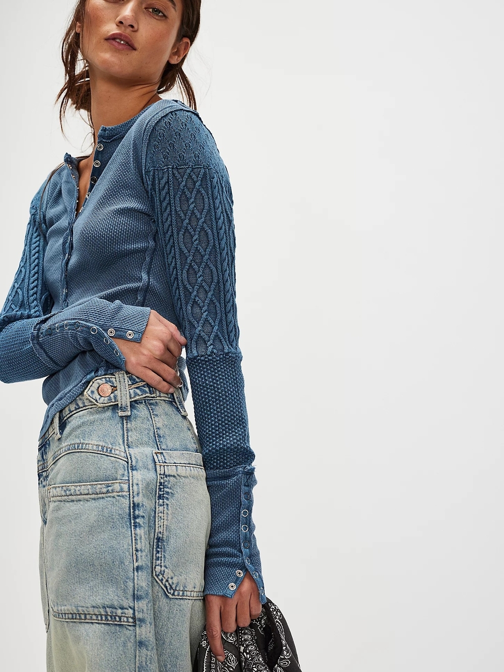 Twisted Cable Cuff thermal top, featuring a snap-button V-neckline